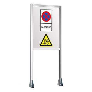 a tall frame made of aluminium profiles, with mounting brackets for ground installation, and framed grey signboard with graphic depictions of loading zone and forklift traffic, isolated on white background