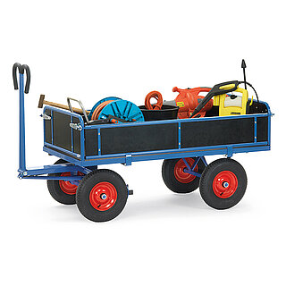 a blue FETRA® hand truck with all-around dark panel boards, air tyres and loaded with cleaning utensils, isolated on white background