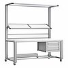 a mobile assembly station made of aluminium profiles on fastenable & turnable wheels, with white table top, angle-adjustable foot rest, angle-adjustable overhead storage area and built-in drawer compartment with three drawers, isolated on white background