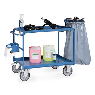 a blue FETRA® table top cart with trays, featuring two storeys and diverse functional accessory add-on parts, isolated on white background