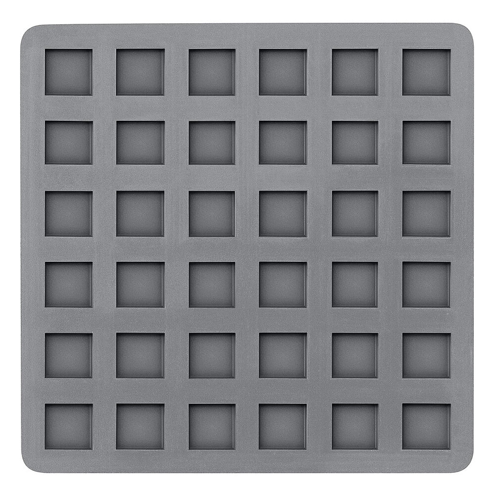 a medium-sized light-grey square elastomer form piece in the flat-lay view from below, with small square profile indentions on the bottom surface, isolated on white background