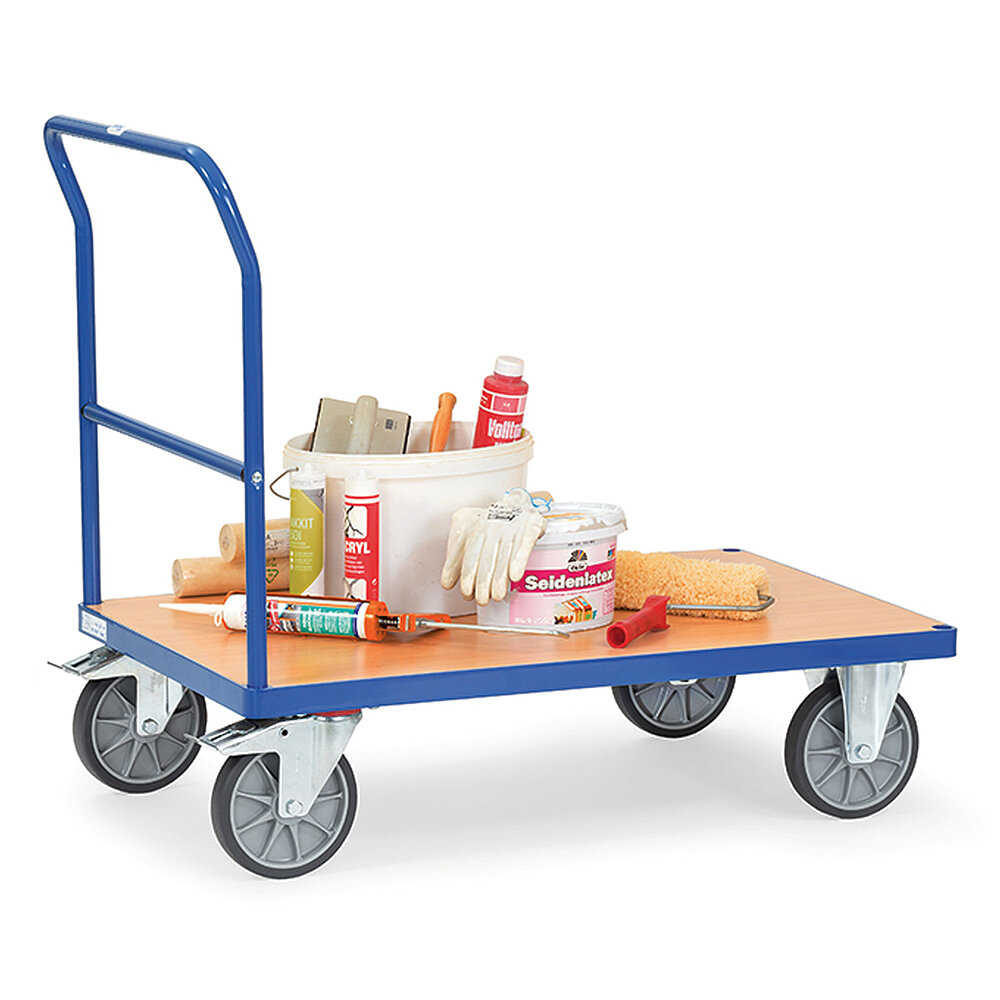 a blue FETRA® platform cart with push bar, made of profiled steel, with extra crossbar at the rear, light-coloured wooden inlay platform, two fixed wheels at the front, two fastenable steering wheels at the rear and loaded with laquering utensils, isolated on white background