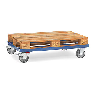 a blue FETRA® pallet dolly with grey TPE wheels, and loaded with an empty EURO palette, isolated on white background